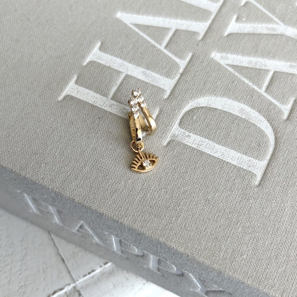 Créoles asymètriques œil pièce unique